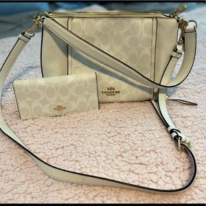 White coach purse with matching checkbook wallet